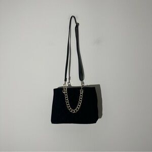 black purse with gold chains